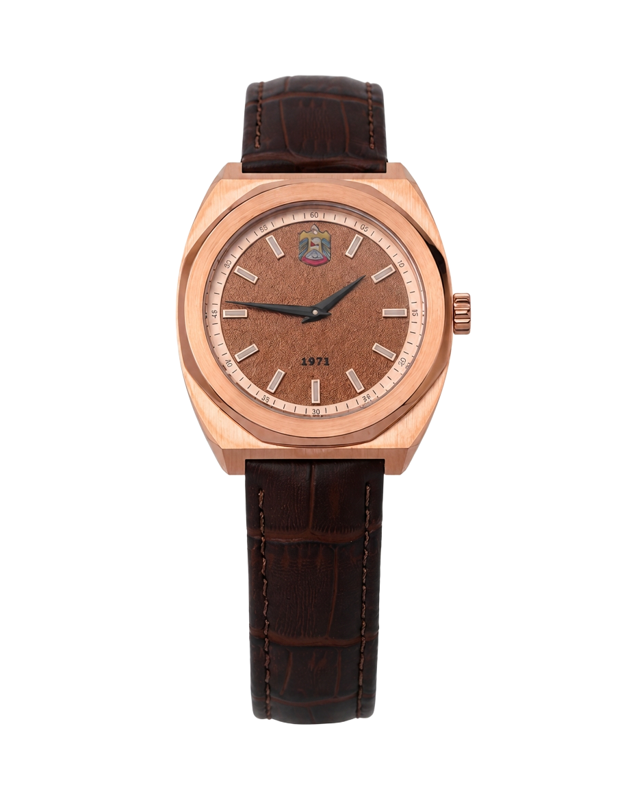 Desert-textured dial with UAE emblem