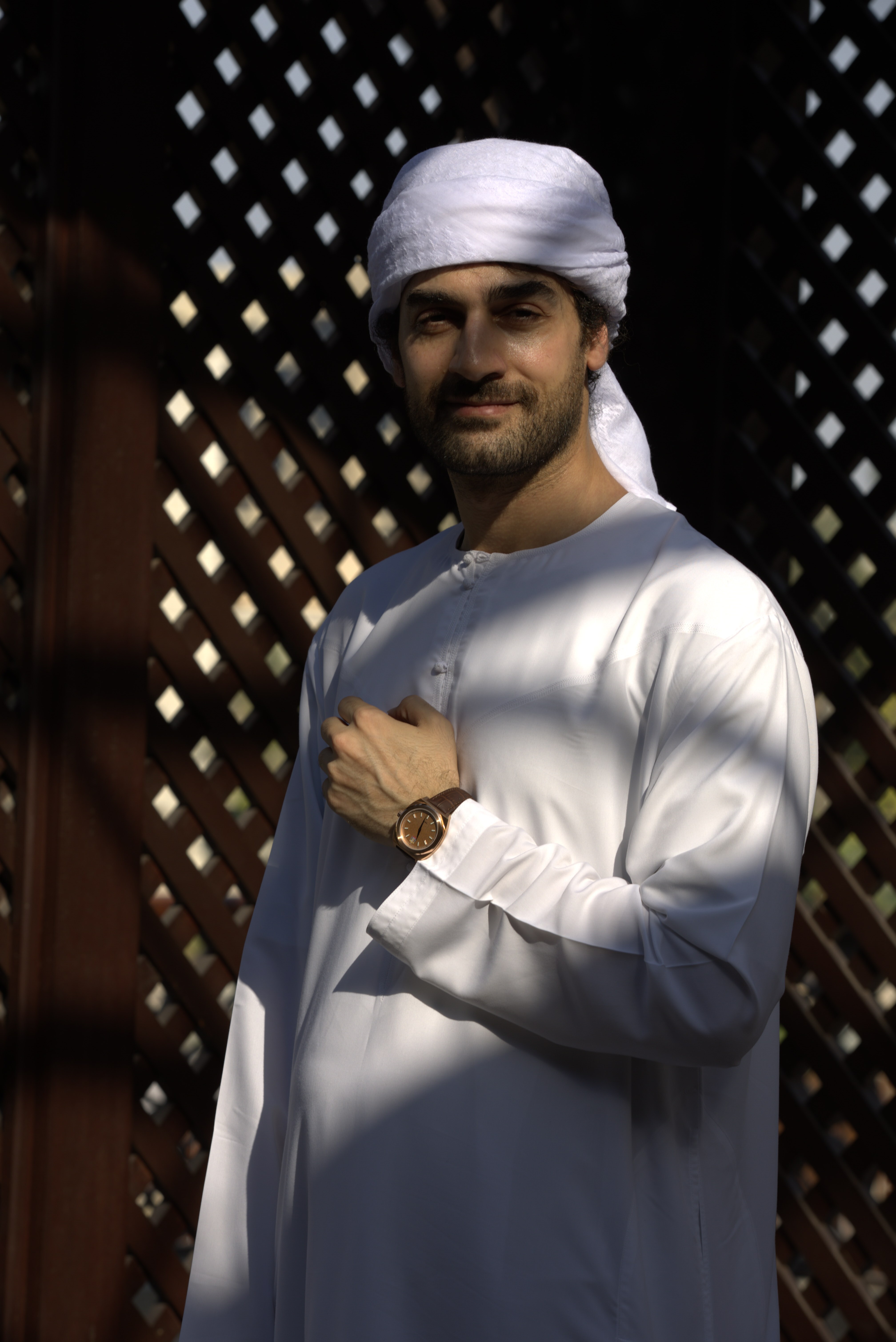 Worn in Emirati dress — rose gold on the wrist
