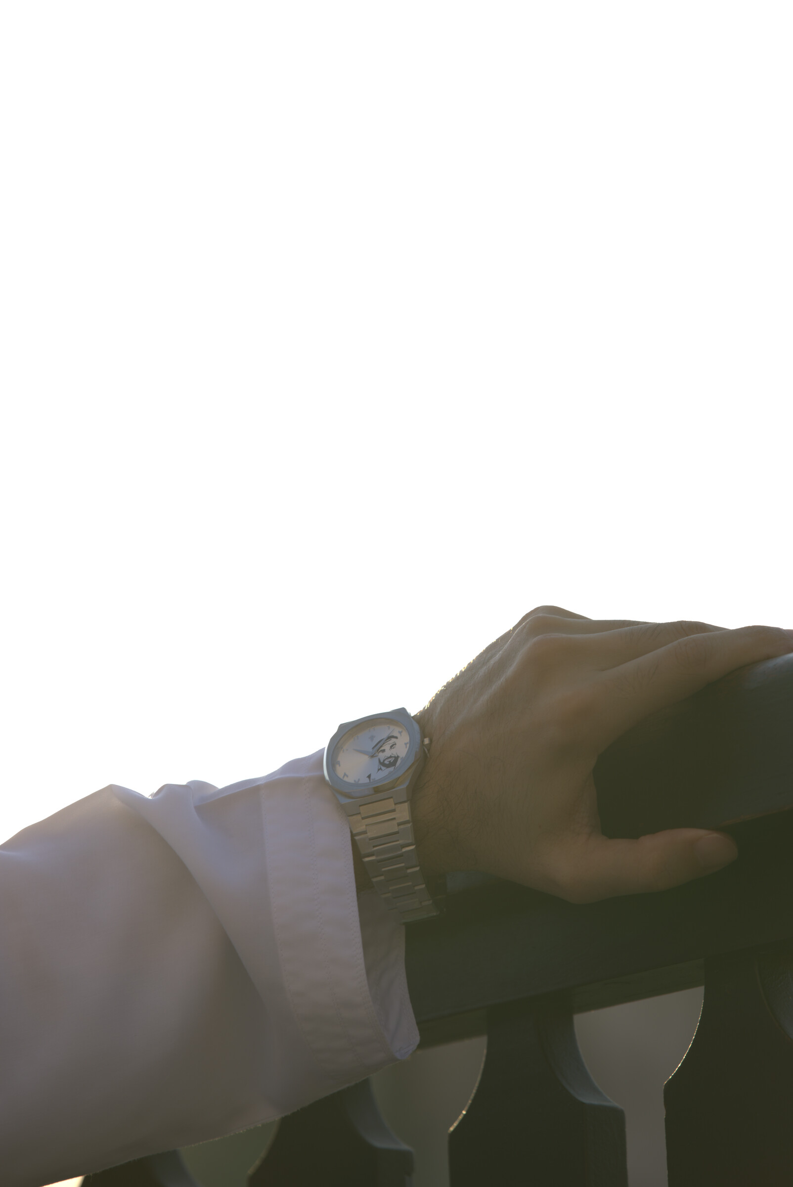 Zayed Edition on the wrist against bright sky